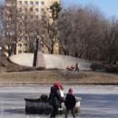 Children walking on frozen fountain (7993544853)